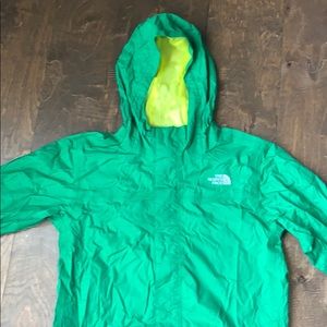 Green North Face windbreaker